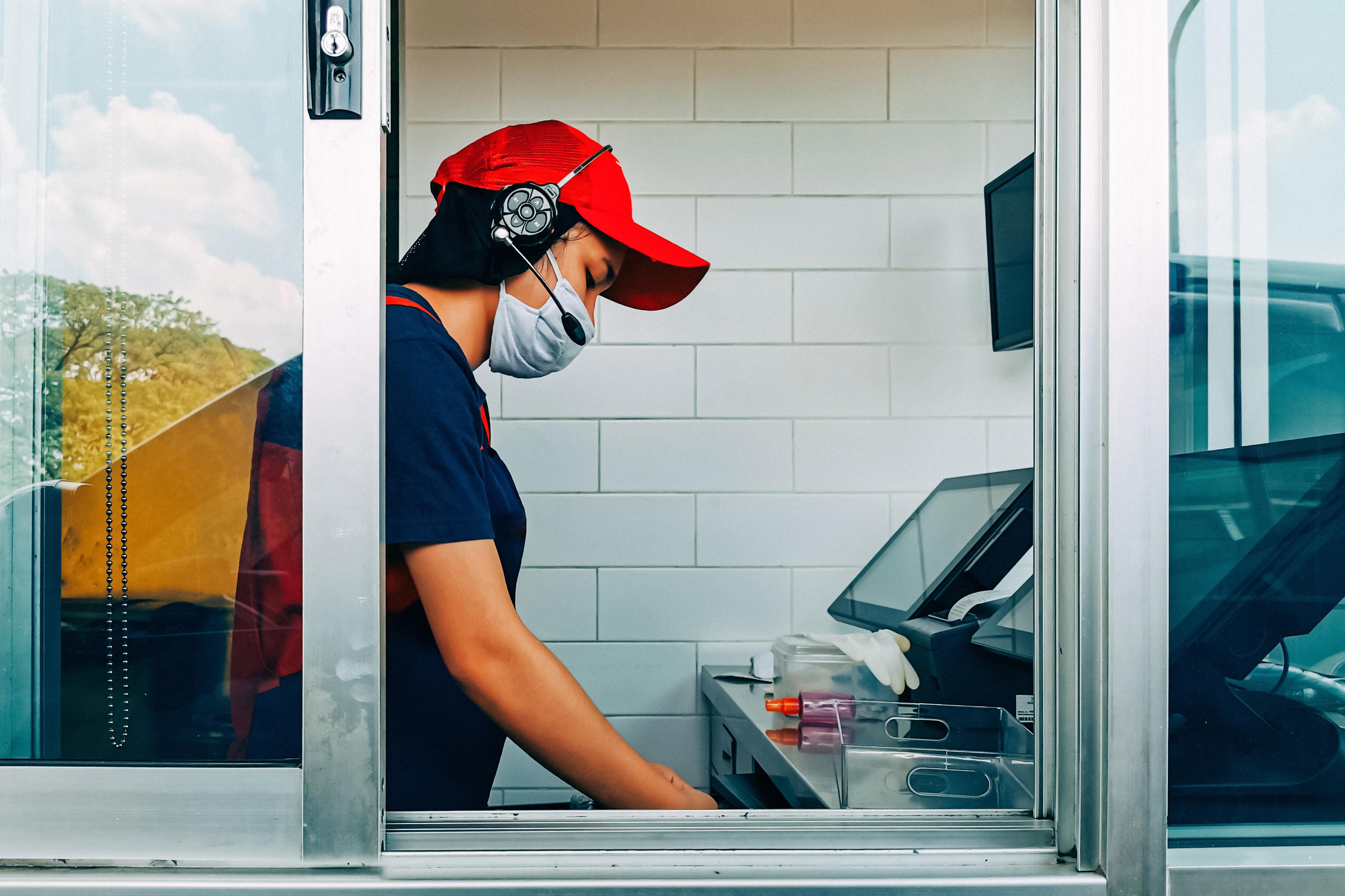Worker at serving window